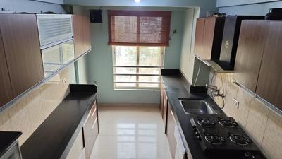 Kitchen Image of 1280 Sq.ft 2 BHK Apartment / Flat for sale in Wagholi Pune for Rs. 9400000