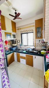 Kitchen Image of 775 Sq.ft 2 BHK Apartment / Flat for sale in Poddar Palm Greens, Makarba Ahmedabad for Rs. 3700000