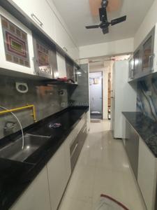 Kitchen Image of 980 Sq.ft 1 BHK Apartment / Flat for rent in Pramukh Sahaj, Chala Vapi for Rs. 13000