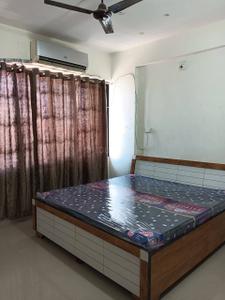 Bedroom Image of 1150 Sq.ft 2 BHK Apartment / Flat for rent in Aawaass River Front, Randesan Gandhinagar for Rs. 20000