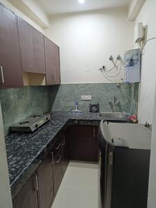 Kitchen Image of 550 Sq.ft 1 BHK Apartment / Flat for rent in Palam Vihar Extension Gurgaon for Rs. 22000