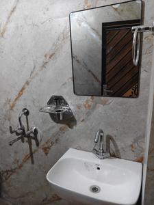 Bathroom Image of 550 Sq.ft 1 BHK Apartment / Flat for sale in Chikamberpur Ghaziabad for Rs. 3500000