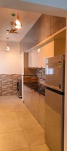 Kitchen Image of 501 Sq.ft 1 RK Apartment / Flat for rent in L And T Raintree Boulevard, Sahakara Nagar Bengaluru for Rs. 50000