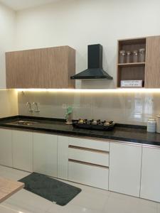 Kitchen Image of 945 Sq.ft 2 BHK Apartment / Flat for sale in Kosmic Kourtyard Phase 1, Wagholi Pune for Rs. 7000000