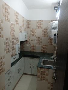 Kitchen Image of 1050 Sq.ft 2 BHK Independent House for rent in Malka Ganj New Delhi for Rs. 32000