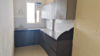 Kitchen Image of 950 Sq.ft 2 BHK Apartment / Flat for rent in Pyramid Elite, Sector 86 Gurgaon for Rs. 19500