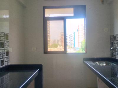 Kitchen Image of 720 Sq.ft 1 BHK Apartment / Flat for sale in Gopal Krishna Krishna Nisarga, Kalyan East Kalyan for Rs. 4250000