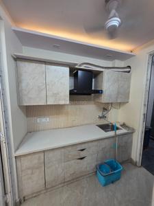 Kitchen Image of 550 Sq.ft 1 RK Builder Floor for rent in Rajouri Garden New Delhi for Rs. 12500