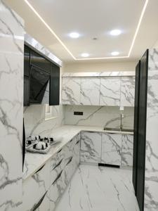 Kitchen Image of 2200 Sq.ft 4 BHK Apartment / Flat for sale in CGHS Shakti Apartments, Sector 5 Dwarka New Delhi for Rs. 39500000