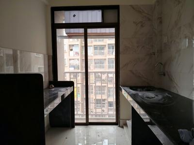Kitchen Image of 608 Sq.ft 1 BHK Apartment / Flat for rent in H B Nandanvan, Taloja Navi Mumbai for Rs. 11000