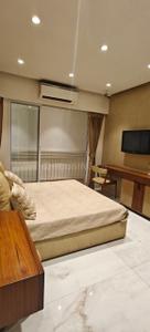 Bedroom Image of 650 Sq.ft 1 BHK Apartment / Flat for sale in JP Codename Starlife, Mira Road East Mira Bhayandar for Rs. 5700000