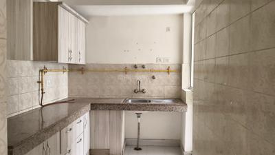 Kitchen Image of 1040 Sq.ft 2 BHK Apartment / Flat for sale in Logix Blossom Greens, Sector 143 Noida for Rs. 7500000