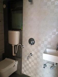 Common Bathroom Image of 666 Sq.ft 1 BHK Apartment / Flat for sale in Amrut Laxmi Raj Regalia Phase I, Ambernath East Ambernath for Rs. 2450000