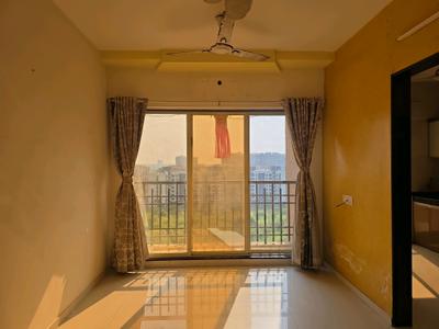 Living Room Image of 700 Sq.ft 1 BHK Apartment / Flat for sale in Agarwal Paramount, Virar West Virar for Rs. 4500000