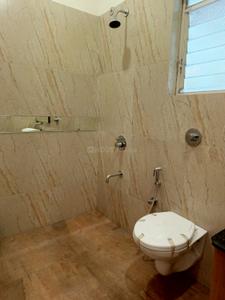 Bathroom Image of 975 Sq.ft 2 BHK Apartment / Flat for sale in Kosmic Kourtyard Phase 2, Wagholi Pune for Rs. 6900000