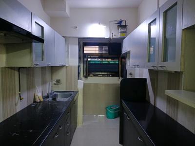 Kitchen Image of 954 Sq.ft 2 BHK Apartment / Flat for rent in Ajmera Bhakti Park, Wadala East Mumbai for Rs. 71000