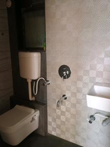 Common Bathroom Image of 665 Sq.ft 1 BHK Apartment / Flat for sale in Tharwani Meghna Montana, Badlapur West Badlapur for Rs. 2800000