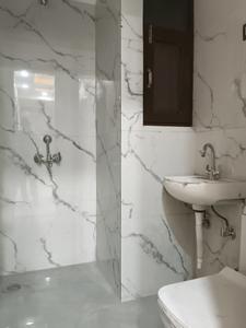 Common Bathroom Image of 1050 Sq.ft 2 BHK Apartment / Flat for sale in Krishna Elite Homes, Noida Extension Greater Noida for Rs. 4175000
