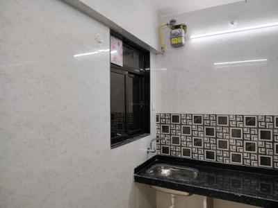 Kitchen Image of 750 Sq.ft 1 BHK Apartment / Flat for rent in Puraniks City Reserva Phase 1, Kasarvadavali Thane for Rs. 15238