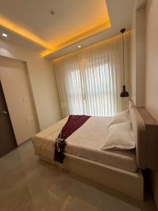 Bedroom Image of 610 Sq.ft 1 BHK Apartment / Flat for sale in KGI Kohinoor Anaya, Ulhasnagar Thane for Rs. 3800000