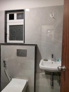 Common Bathroom Image of 603 Sq.ft 1 BHK Apartment / Flat for sale in Metro Devbhoomi, Jogeshwari East Mumbai for Rs. 13000000