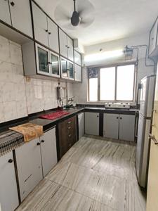 Kitchen Image of 900 Sq.ft 2 BHK Apartment / Flat for rent in Hyde Park Premium CHS Ltd E1 E2 Buildings, Thane West Thane for Rs. 40000