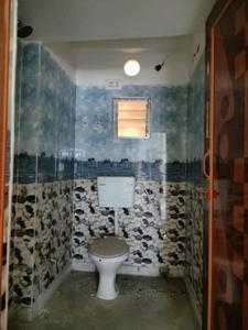 Common Bathroom Image of 630 Sq.ft 2 BHK Apartment / Flat for sale in Baguiati Kolkata for Rs. 1750000
