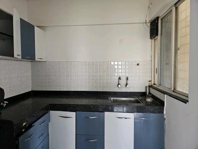 Kitchen Image of 810 Sq.ft 2 BHK Apartment / Flat for sale in Majestique Manhattan, Wagholi Pune for Rs. 5952500
