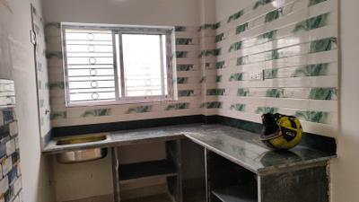 Kitchen Image of 650 Sq.ft 2 BHK Apartment / Flat for sale in Airport Gate No 2 Kolkata for Rs. 2500000