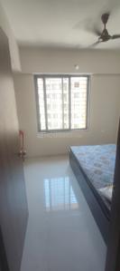 Bedroom Image of 970 Sq.ft 2 BHK Apartment / Flat for rent in Nexus Gulmohar, Charholi Budruk Pune for Rs. 16000
