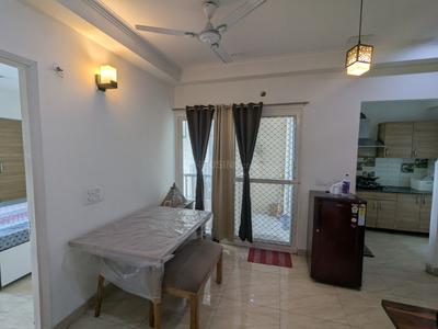 Living Room Image of 623 Sq.ft 2 BHK Apartment / Flat for rent in Gaur City 7th Avenue, Noida Extension Greater Noida for Rs. 32000