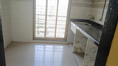 Kitchen Image of 600 Sq.ft 1 BHK Apartment / Flat for sale in Aaron Shree Chamunda Harmony, Kamothe Navi Mumbai for Rs. 7300000
