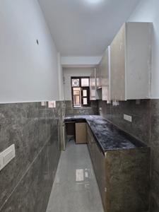 Kitchen Image of 720 Sq.ft 2 BHK Builder Floor for rent in Rajpur Khurd Extension New Delhi for Rs. 26000