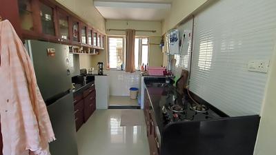 Kitchen Image of 1010 Sq.ft 2 BHK Apartment / Flat for sale in Chirag GV7 Insignia Building B And C, Ambegaon Budruk Pune for Rs. 8500000