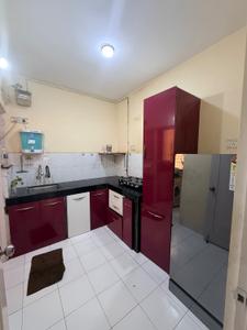 Kitchen Image of 1040 Sq.ft 2 BHK Apartment / Flat for rent in Lunkad Zodiac, Viman Nagar Pune for Rs. 38000