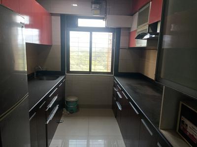 Kitchen Image of 650 Sq.ft 2 BHK Apartment / Flat for rent in Lodha Splendora, Kasarvadavali Thane for Rs. 35000