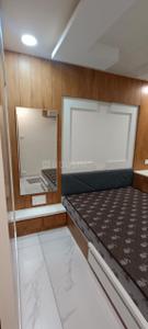 Bedroom Image of 1300 Sq.ft 3 BHK Apartment / Flat for rent in Yogi Nagar Rajkot for Rs. 32000