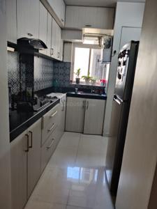 Kitchen Image of 700 Sq.ft 2 BHK Apartment / Flat for rent in Lodha Amara, Kolshet Thane for Rs. 40000