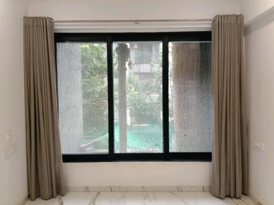 Living Room Image of 764 Sq.ft 1 BHK Apartment / Flat for sale in Rassaz Greens , Mira Road East Mira Bhayandar for Rs. 8600000