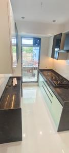 Kitchen Image of 560 Sq.ft 1 BHK Apartment / Flat for sale in Thane West Thane for Rs. 3600000
