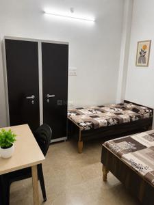 Bedroom Image of OM Residence in Dostpur Mangroli Khadar, Noida