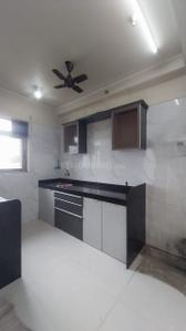 Kitchen Image of 1150 Sq.ft 2 BHK Apartment / Flat for sale in Vishesh Balaji Symphony, Shilottar Raichur Navi Mumbai for Rs. 8200000