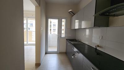 Kitchen Image of 1059 Sq.ft 2 BHK Apartment / Flat for sale in Bhartiya Nikoo Homes Phase 2, Thanisandra Bengaluru for Rs. 14000000