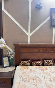 Bedroom Image of Kawal PG in Rajouri Garden, New Delhi