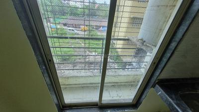 Balcony Image of 666 Sq.ft 1 BHK Apartment / Flat for sale in Laxmi Complex, Taloja Navi Mumbai for Rs. 3600000