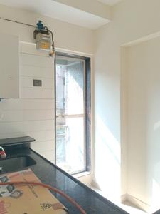 Kitchen Image of 575 Sq.ft 1 BHK Apartment / Flat for rent in Unnati Woods Phase 7, Kasarvadavali Thane for Rs. 18000