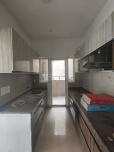 Kitchen Image of 1495 Sq.ft 3 BHK Apartment / Flat for sale in Gulshan Bellina, Noida Extension Greater Noida for Rs. 14800000