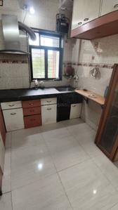 Kitchen Image of 900 Sq.ft 2 BHK Apartment / Flat for rent in Virat Tower, Kalwa Thane for Rs. 35000