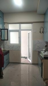 Kitchen Image of 1050 Sq.ft 2 BHK Apartment / Flat for rent in Sikka Karnam Greens, Sector 143B Noida for Rs. 25500