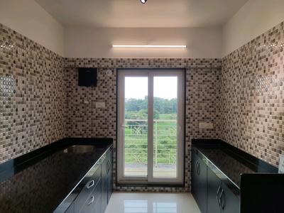 Kitchen Image of 1050 Sq.ft 2 BHK Apartment / Flat for sale in Kalyan East Kalyan for Rs. 8500000